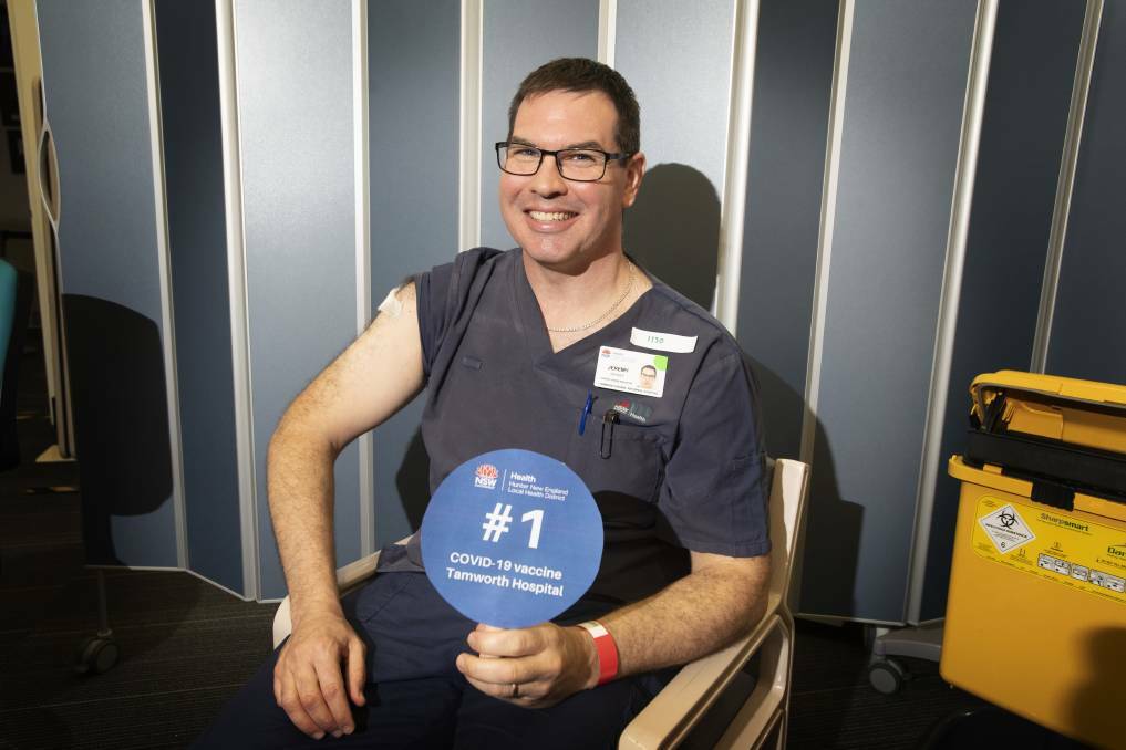 FIRST JAB: Intensive Care Unit clinical nurse educator Jeremy Deasey was the first essential healthcare worker to receive the AstraZeneca vaccine in Tamworth in March. Photo: Peter Hardin 