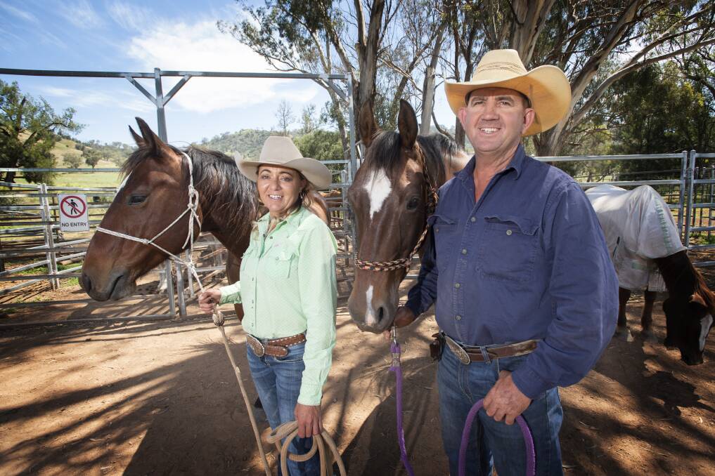 ADVENTURE: Tamworth and Kootingal Horse Riding Adventures business owners Christine Ogilvie and Jason Newman. Photo: Peter Hardin