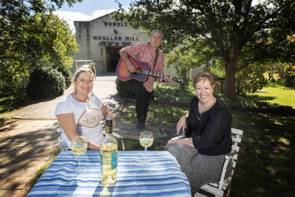 PICNIC TIME: Organiser Teree Burr, musician Jeff Gibson and Nundle Woollen Mill owner Kylie Bradford. Photo: Peter Hardin
