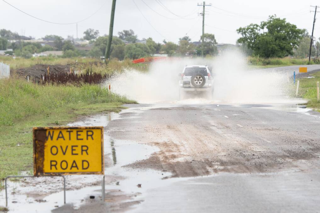 CAUTION: Local roads have been flooded after heavy rain fell in the region in the past 24 hours. Photo: Peter Hardin