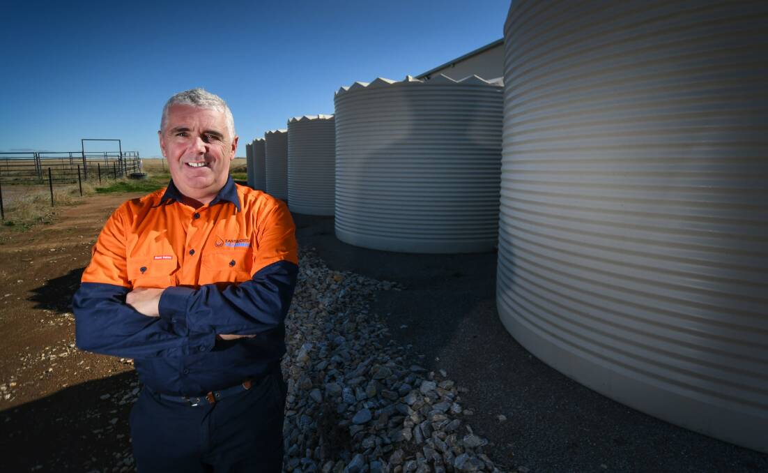 KEEPING BUSY: Tamworth Plumbing manager Kevin Marsden has seen a spike in interest in rainwater tanks since rain began falling again. Photo: Gareth Gardner