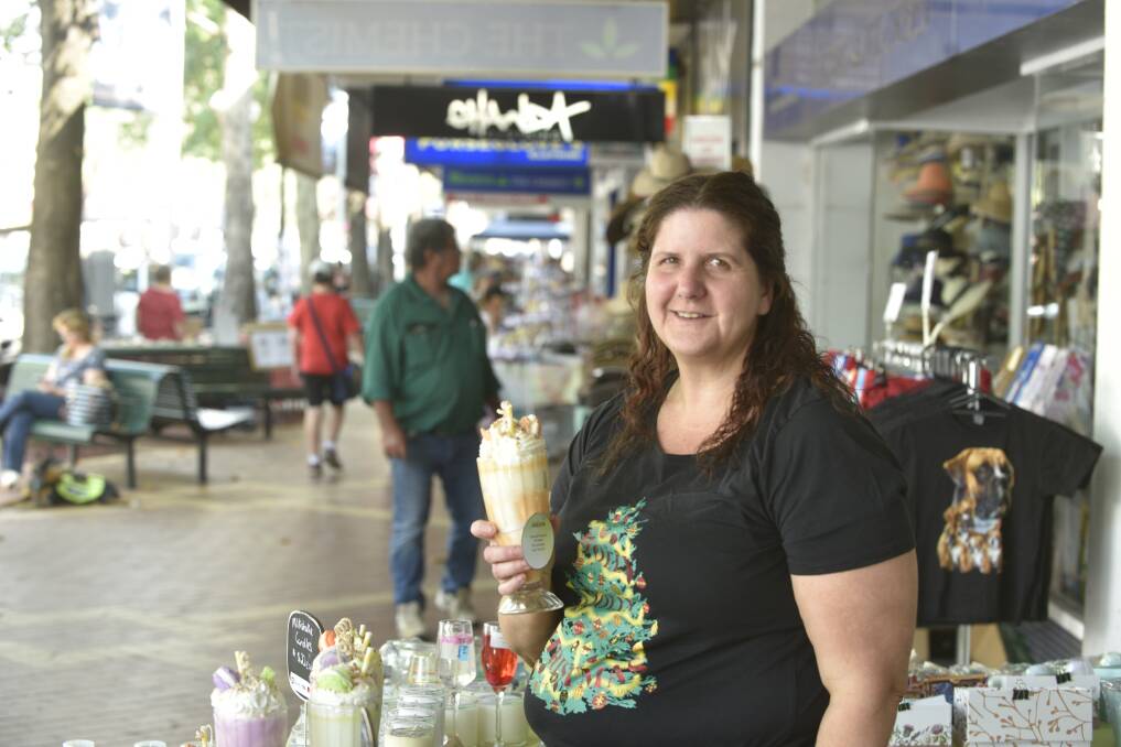 On hold: Rachel Kenny selling her confectionery themed oils and soaps. Photo: Jacob McArthur