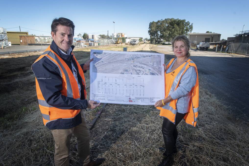 GROUND BREAKING: MP Kevin Anderson and Transport for NSW Regional Director Anna Zycki show off new plans for the Tamworth intermodal hub. Photo: Peter Hardin 050520PHA006