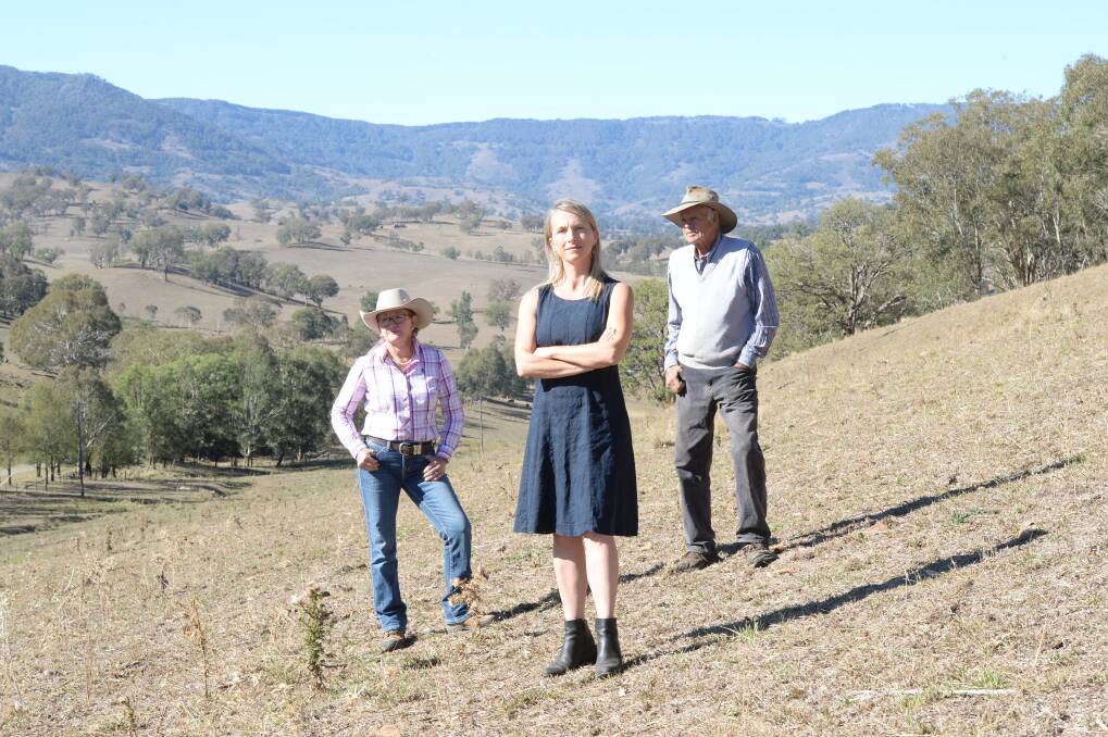 UGLY: Hills of Gold Preservation Inc member Megan Trousdale (middle) said the project would ruin the view. Pictured with Vicki Dempsey (left) and Ian Worley Snr (right). Photo: file