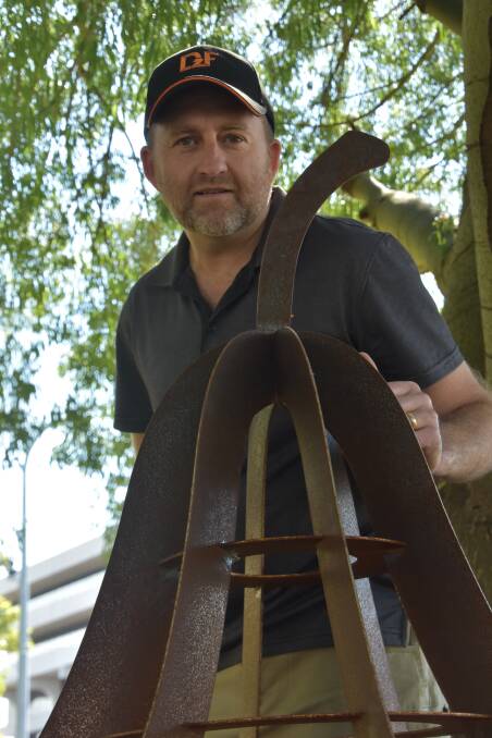 FABRICATED: Jason Balsar of Design to Fab makes 3D fabricated objects like this steel pear sculpture made out of 3mm core 10 and saw lasercut which was welded together to be a garden centrepiece. Photo: Andrew Messenger