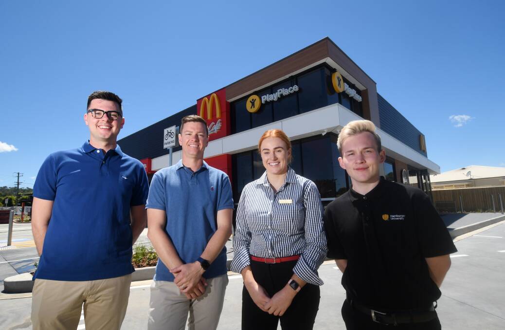 NEW STORE: Operations Manager Ethan Hodges, Franchisee Adrian Sippel with Restaurant Managers Tarryn Rizzi and Darcy Geddes prepare to open the doors of Tamworth's new McDonald's. Photo: Gareth Gardner 