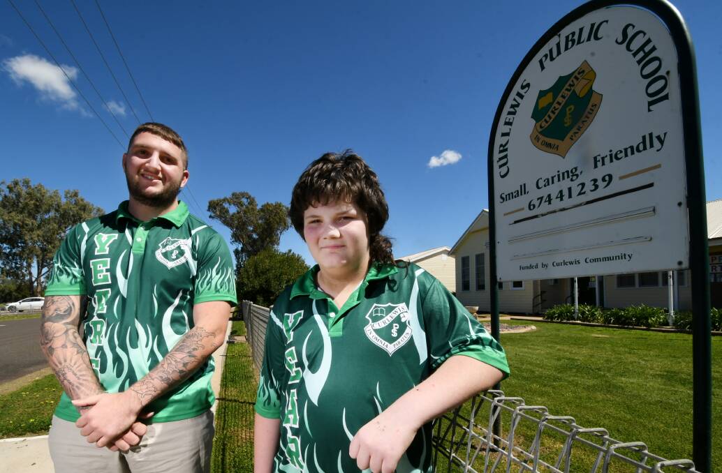 PRIZE POEM: Curlewis Public School student Cooper King-Seach (right) wrote a winning poem about teacher James "Frog" Hogbin. Photo: Gareth Gardner 