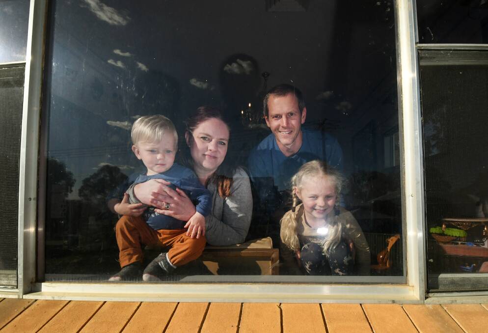 BEHIND GLASS: The Bice family have spent the COVID-19 crisis observing strict self-isolation rules to protect Dante and his damaged lungs. Photo: Gareth Gardner 220921GGF01