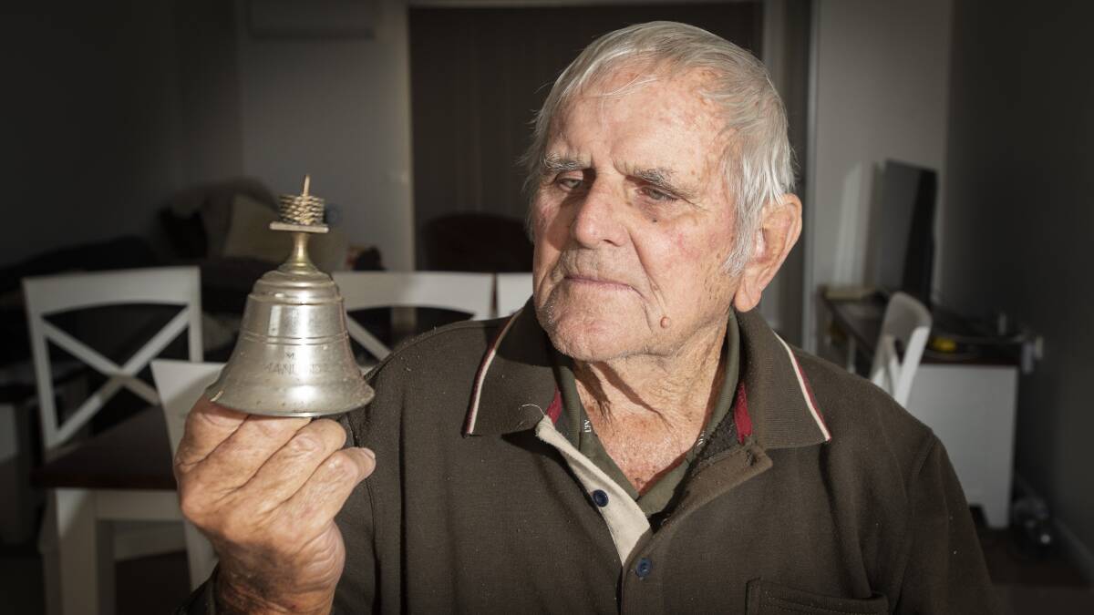 DARWIN BOMBING: Ray Minter uncovered the ship's bell from MV Manunda recently. Photo: Peter Hardin