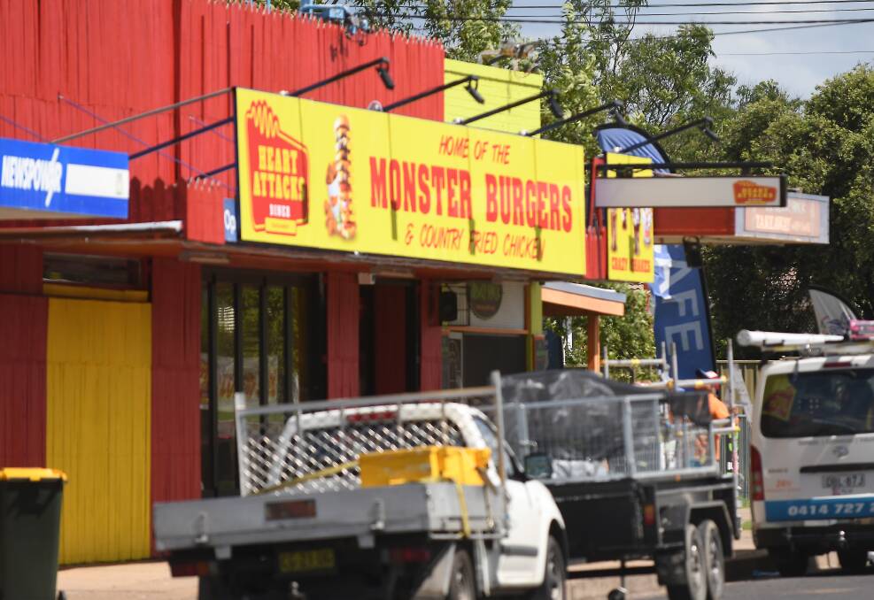 HEART ATTACK: A new restaurant hawking "diabetic desserts", "heartburn wings" and an octuple burger will replace a defunct health food store in Australia's most obese suburb. Photo: Gareth Gardner 