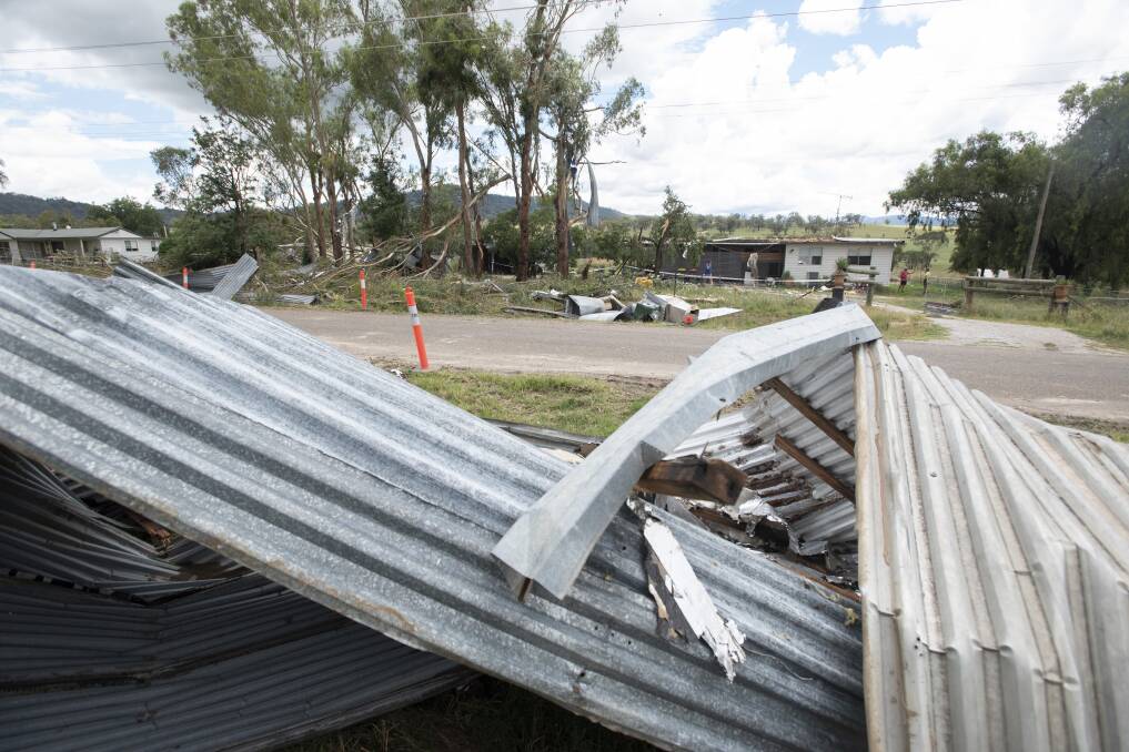 LUCKY ESCAPE: Debris was thrown dozens of metres by the thunderstorm. Fortunately, it was all thrown away from neighbouring homes, which have survived the storm intact. Photo: Peter Hardin 
