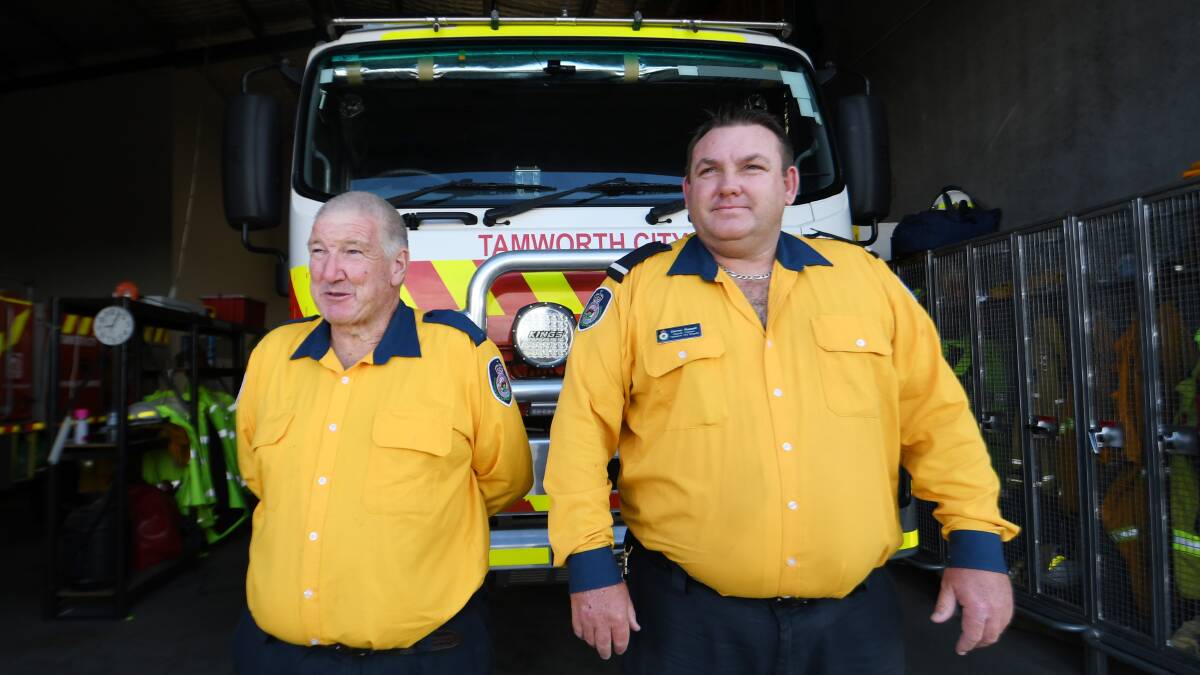 LONG BATTLE: Firefighter Graham Brown and Deputy Captain Darren Russell say a quiet fire season has been a wonderful reprieve. Photo: Gareth Gardner