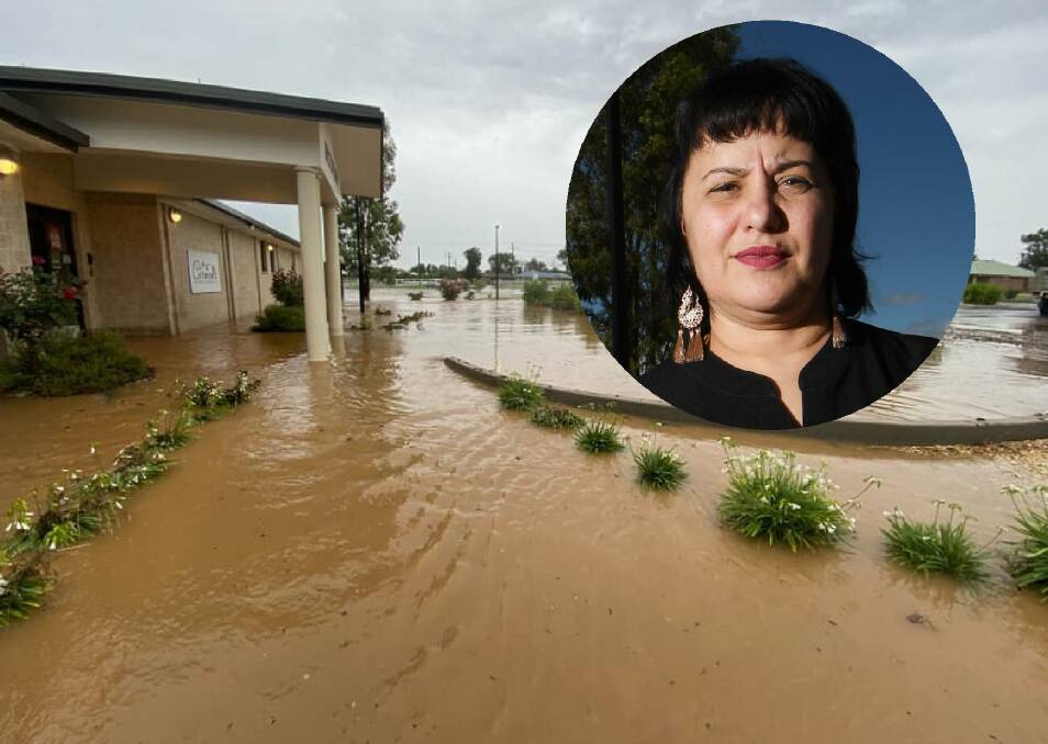 FLOODED: A small army came to the aid of Carmen's restaurant owner Carmen O'Sullivan after the local small business was inundated after a thunderstorm on Tuesday night. Photo: Gareth Gardner