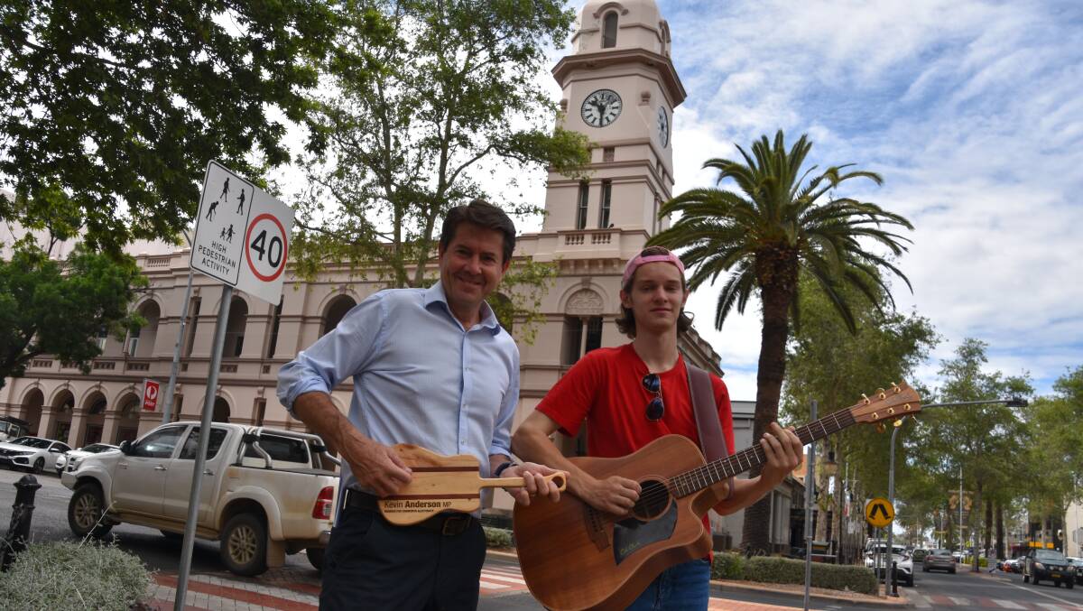 IN TUNE: Tamworth MP Kevin Anderson and Freddie Bailey-Cook 'FredBear' celebrate the new TAFE course. Photo: Andrew Messenger 