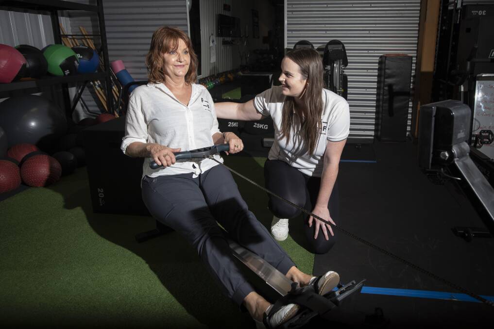 FITNESS BATTLE: Practice Manager Janet McRae and Exercise Physiologist Alana Johnstone try out the Fit2Function gear. Photo: Peter Hardin
