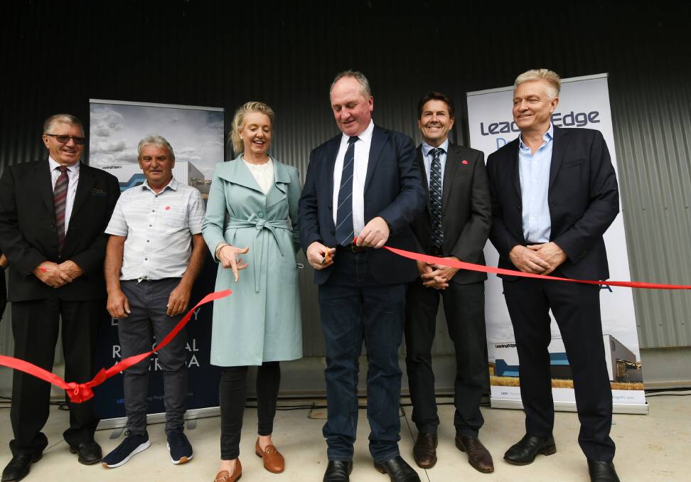 GRAND OPENING: Deputy Prime Minister Barnaby Joyce and Minister for Regional Communications Bridget McKenzie (centre) cut the ribbon for the new facility on Friday. Photo: Gareth Gardner 