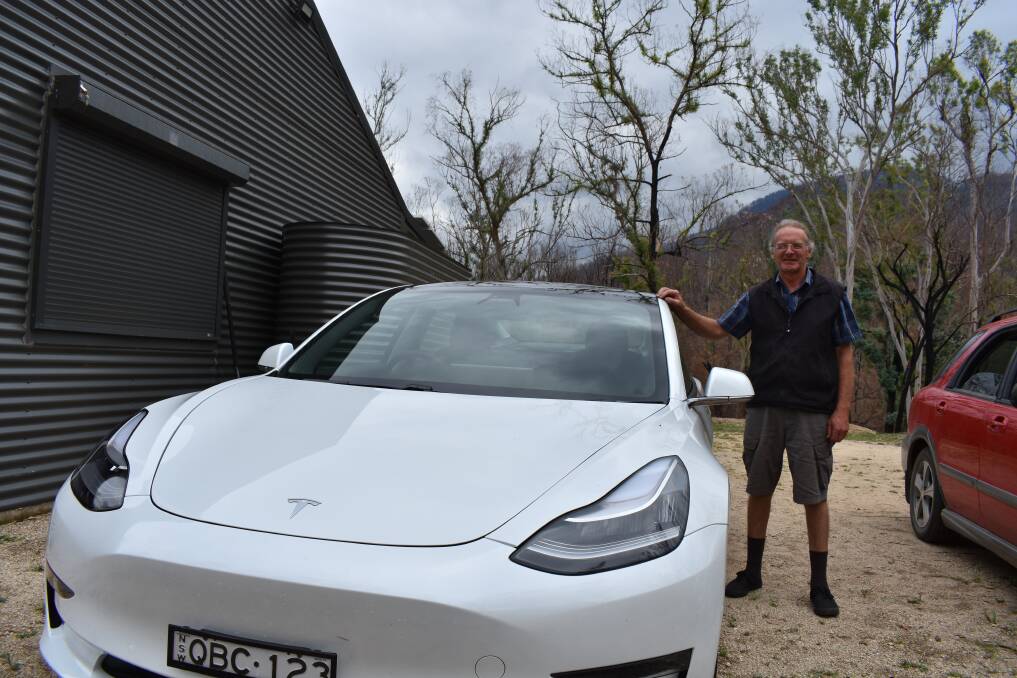 Gimme shelter: Phil Hine's Tesla might be the world's most expensive homelessness shelter. He's been half-living out of it since last year's devastating Kangawalla blaze on November 8. Photo: Andrew Messenger 