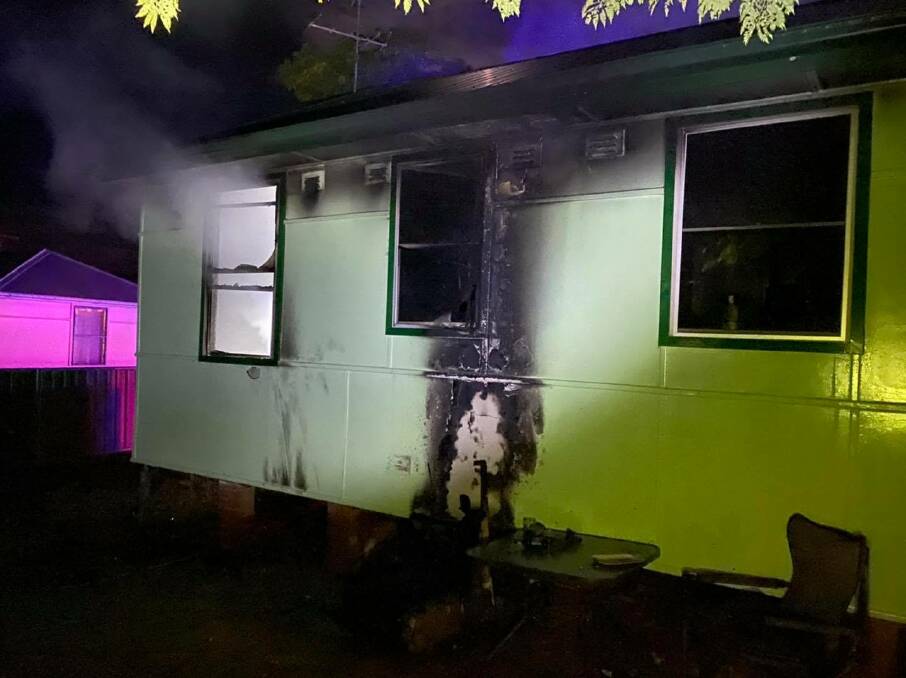 DAMAGED: A South Tamworth house sustained extensive damage in a house fire on Friday night. Photo: Fire and Rescue NSW