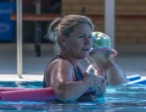 CHANGING LIVES: Aqua-fit instructor and community health nurse Megan Latham takes a class in aqua-aerobics. Photo: Bingara MPS 