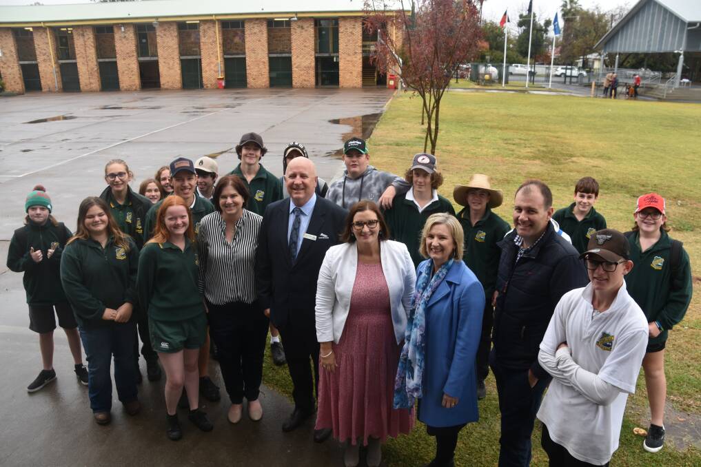 NEW SCHOOL: Education Minister Sarah Mitchell (centre) announced that Wee Waa's new high school would be built on a site on Mitchell Street locals call "the swamp". Photo: Andrew Messenger 