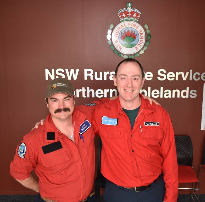 FOREIGN HELP: Canadians Chris Werrell and Mark Healy are spending Christmas away from their families to help the Glen Innes-based bushfire effort. Pictures: Andrew Messenger. 
