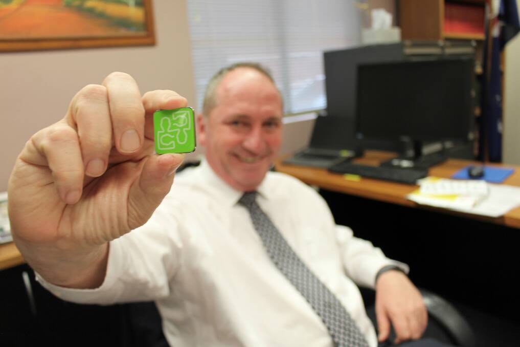 HELPING HAND: Barnaby Joyce shows off a headspace pin. The service will help young people get into work as part of a new program. Photo: supplied