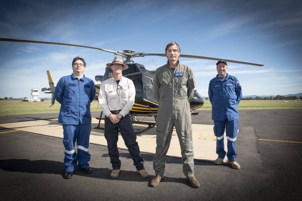 FLYING HIGH: Brendan Williams, Ken Jakobi, Dan Cross, David Stapleton are just one crew that will check the state's fire trails from the air. Photo: Peter Hardin