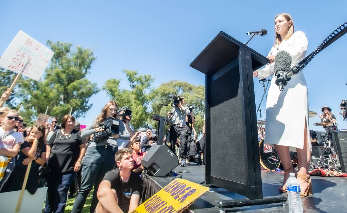 March 4 Justice protest at Parliament house, Canberra. Brittany Higgins speaks to the crowd. Picture: Karleen Minney.