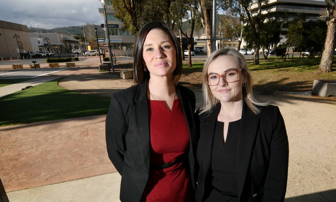 YOUNG BUYERS: Stacks Law Firm's Anneka Frayne and Madison Burns have both recently entered into the Tamworth property market, and the decision to buy vs rent has been a beneficial one. Photo: Gareth Gardner 160721GGD02 
