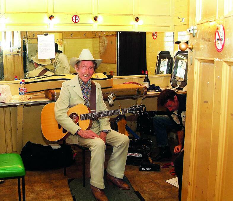 TRUE BLUE: Smoky backstage for a concert at Tamworth Town Hall, with Lawrie Minson 2006. Photo: Supplied