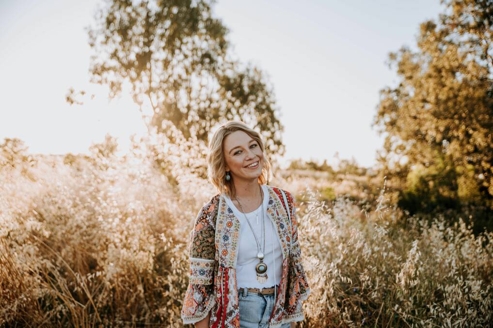 UP BEAT: Ashleigh Dallas' new single, Dancing In The Kitchen, debuted at No. 3 on the iTunes Australia Country Songs Chart last Friday. Photo: Supplied