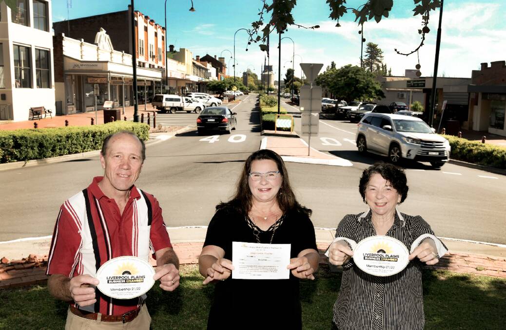 CHRISTMAS COVERED: Ray Lamb, Tammie Clark and Ros Wallace from the Liverpool Plains Business Chamber pictured holding the 'Shop Locally' vouchers which can be redeemed across the region. Photo: Sally Alden 