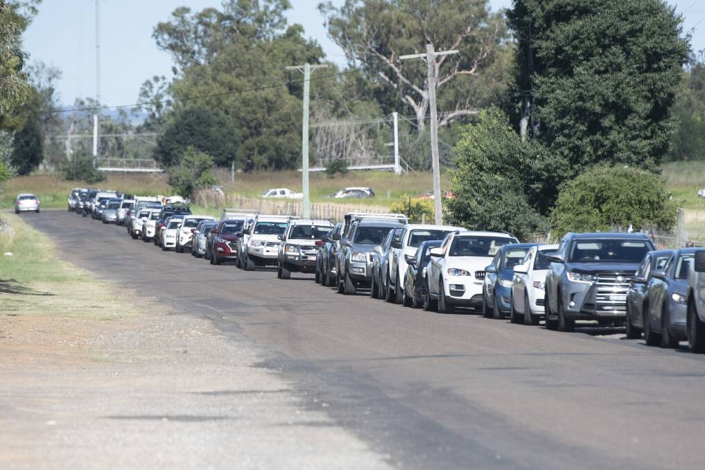 LONG WAIT: Locals reported waiting for hours at the Marius Street Sporting Fields Laverty drive-through testing clinic when it opened on Wednesday morning. Photo: Peter Hardin