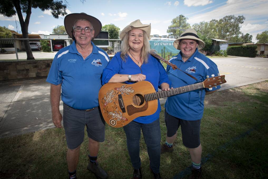 SHOW GOES ON: Austin Tourist Park owner Frank Edwards, singer Tracy Coster and park manager Allison Edwards are excited to keep the festival feel alive this week. Photo: Peter Hardin