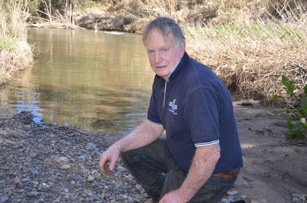 FULL FLOW: Irrigator Ian Coxhead, pictured in front of Cockburn River which has benefited from heavy rain, said Chaffey Dam hitting 100 per cent will be a boost for local farmers. Photo: Cody Tsaousis.