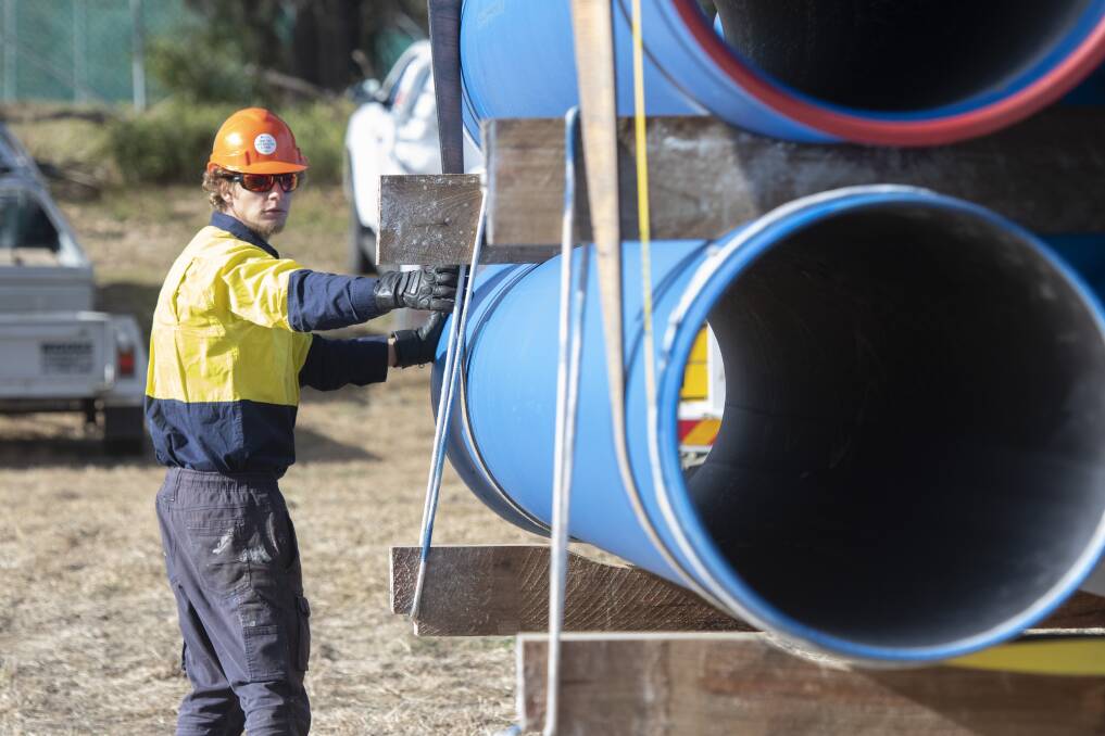 PIPING UP: Pipes which will be used in phase one of the Dungowan Dam pipeline project were offloaded at Calala Water Treatment Facility on Tuesday morning. Photo: Peter Hardin.