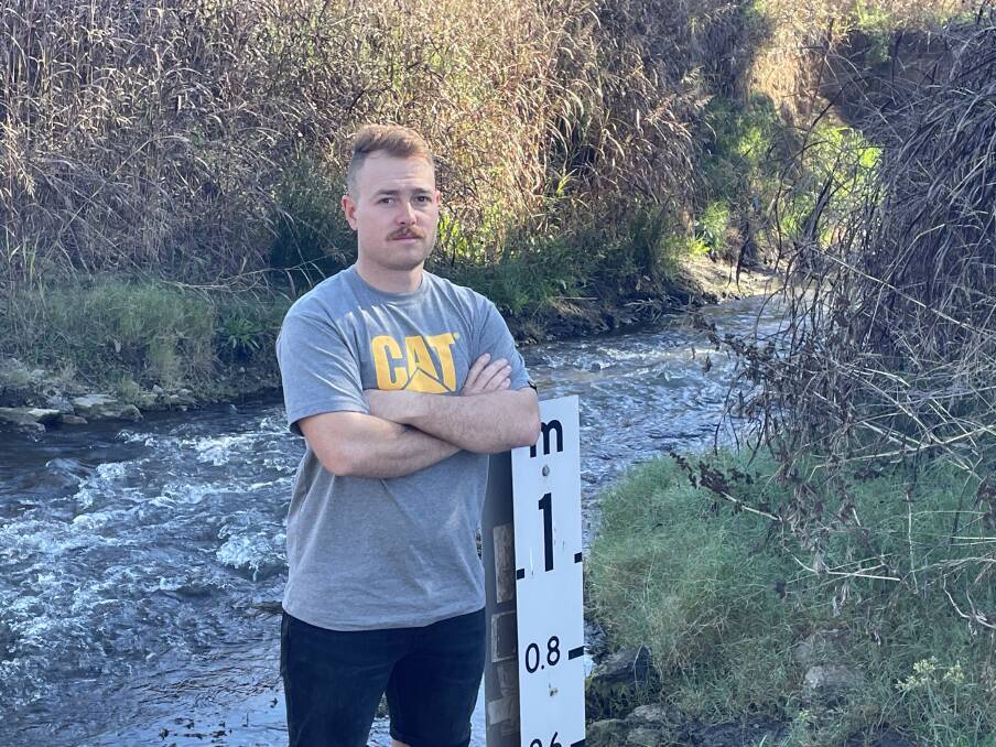 UNSAFE: Former Kingswood local Bryson Shepherdson pictured alongside the troublesome causeway which has proved too difficult for some drivers to navigate. Photo: Cody Tsaousis