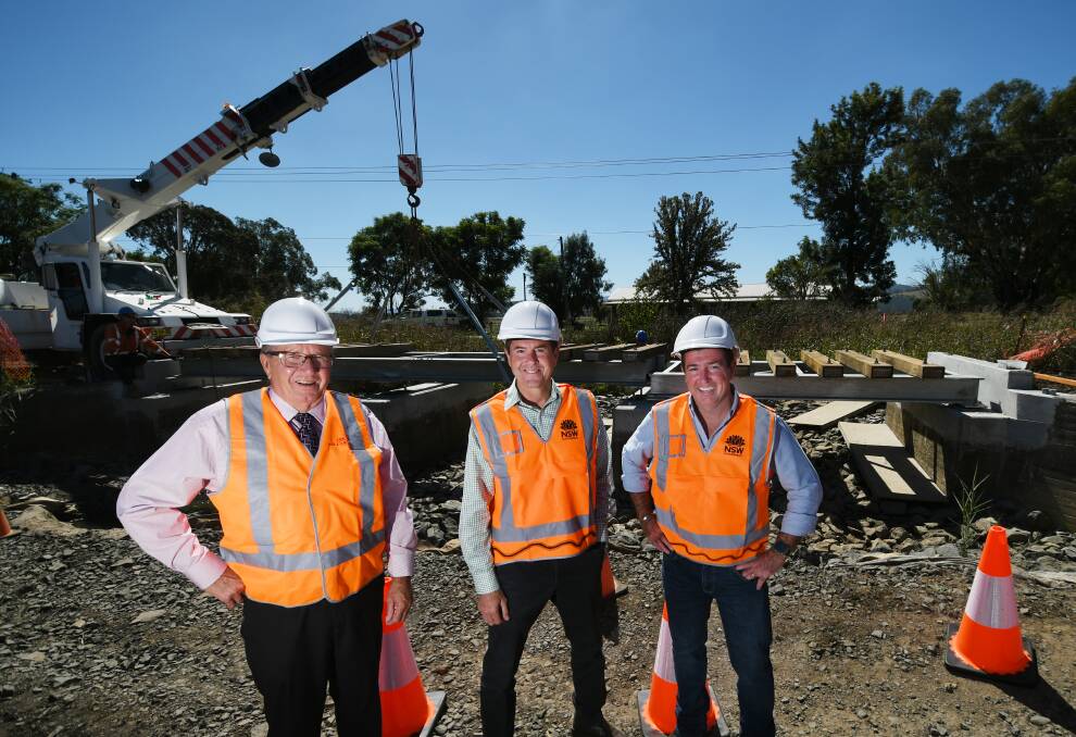 VISIBLY PLEASED: Col Murray, Kevin Anderson and Paul Toole were happy to see progress being made on the Regional Freight Terminal. Photo: Gareth Gardner.