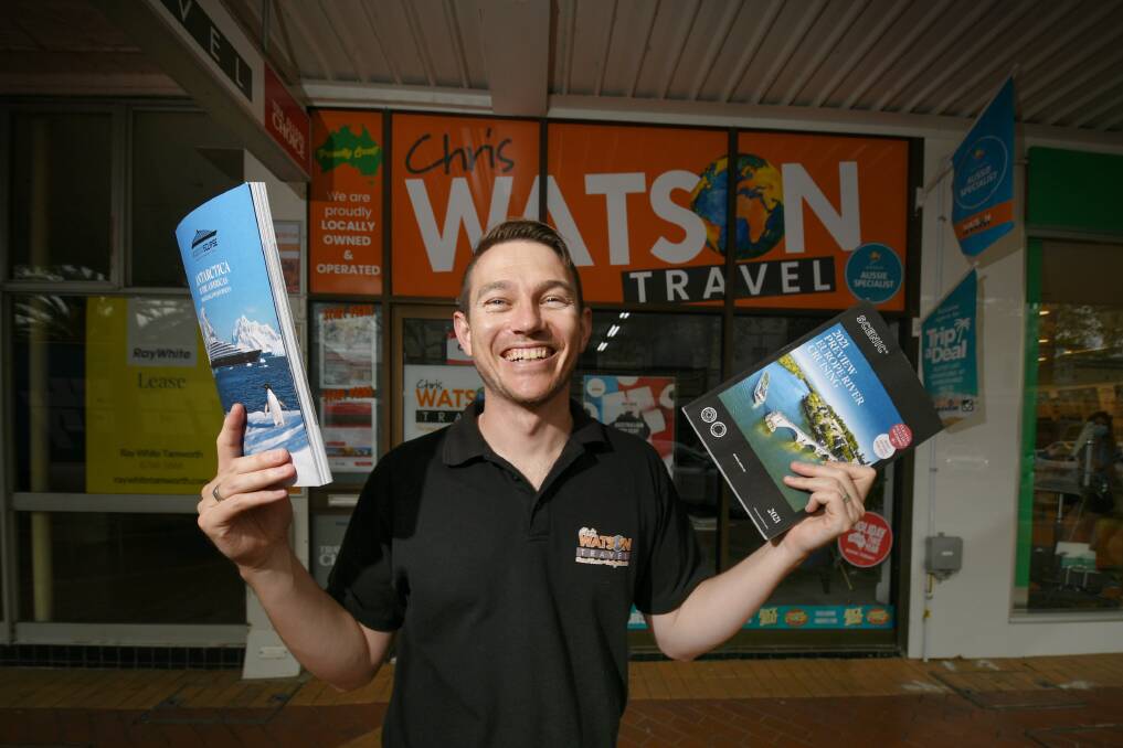 OPENING UP: After two years of border restrictions, Australia has thrown the gate open to international travellers from February 21, much to the delight of local travel agent Chris Watson. Photo: Gareth Gardner, file