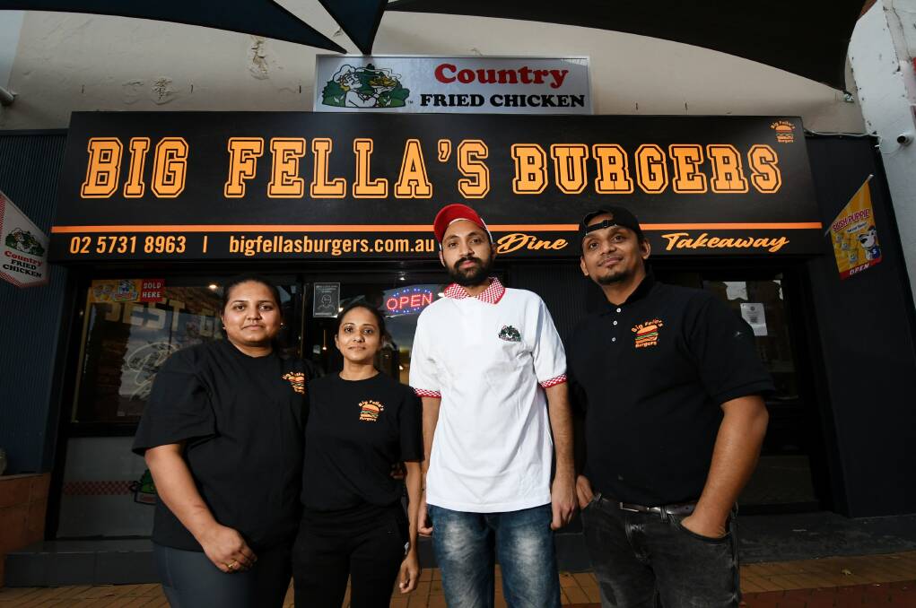 FOOD FANATICS: Mansi Patel, Twinkal Patel, Amit Patel and Sarvesh Patel have opened up Tamworth's newest restaurant Big Fella's Burgers. Photo: Gareth Gardner 140721GGE03
