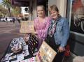 POPULAR: Sonia Reid and Maureen McAlister were kept busy at the Peel Street Markets on Sunday morning.