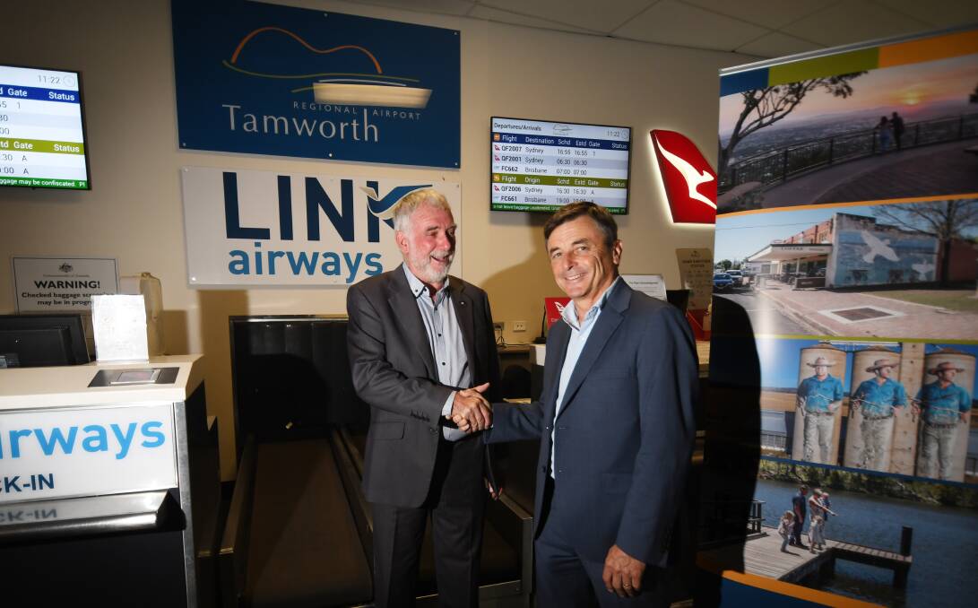 UP AND ABOUT: Tamworth Regional Council mayor Russell Webb and Link Airways Jeff Boyd were happy to announce and extra Tamworth - Sydney service from the airport. Photo: Gareth Gardner
