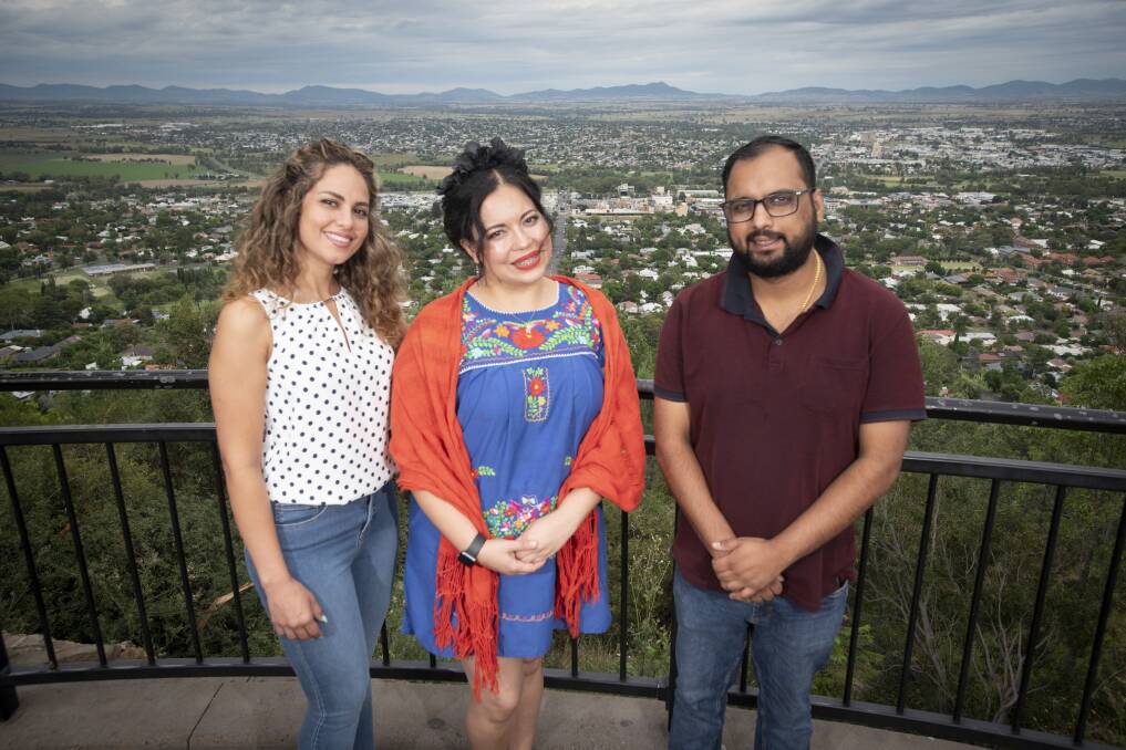 HAPPY HOME: Elnaz Boustani, Sandra Zuniga and Manoj Khullar are three of Tamworth's proudest residents, despite taking very different paths to get there. Photo: Peter Hardin