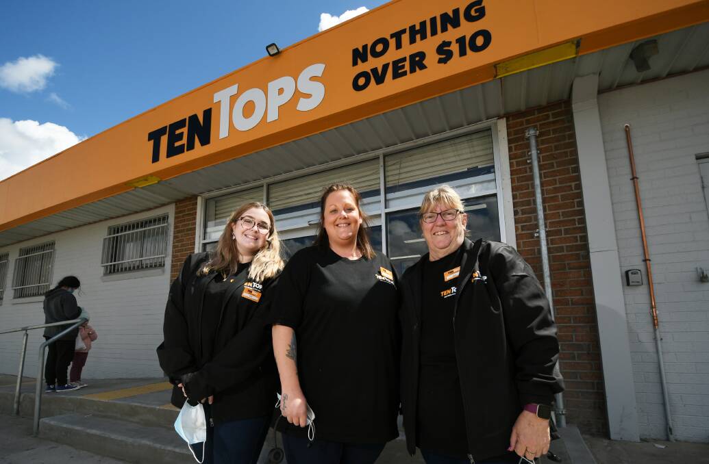 BARGAIN BUY: Holly McIntosh, Tameeka McLaren and Nina Gardner were thrilled to see so many people attend the store's opening. Photo: Gareth Gardner 210921GGB02