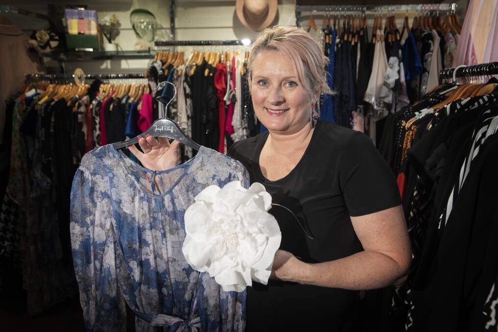 DRESSING UP: Town and Country Boutique's Debbie Woods is enjoying the rush in the lead up to Tamworth Cup: Photo: Peter Hardin.