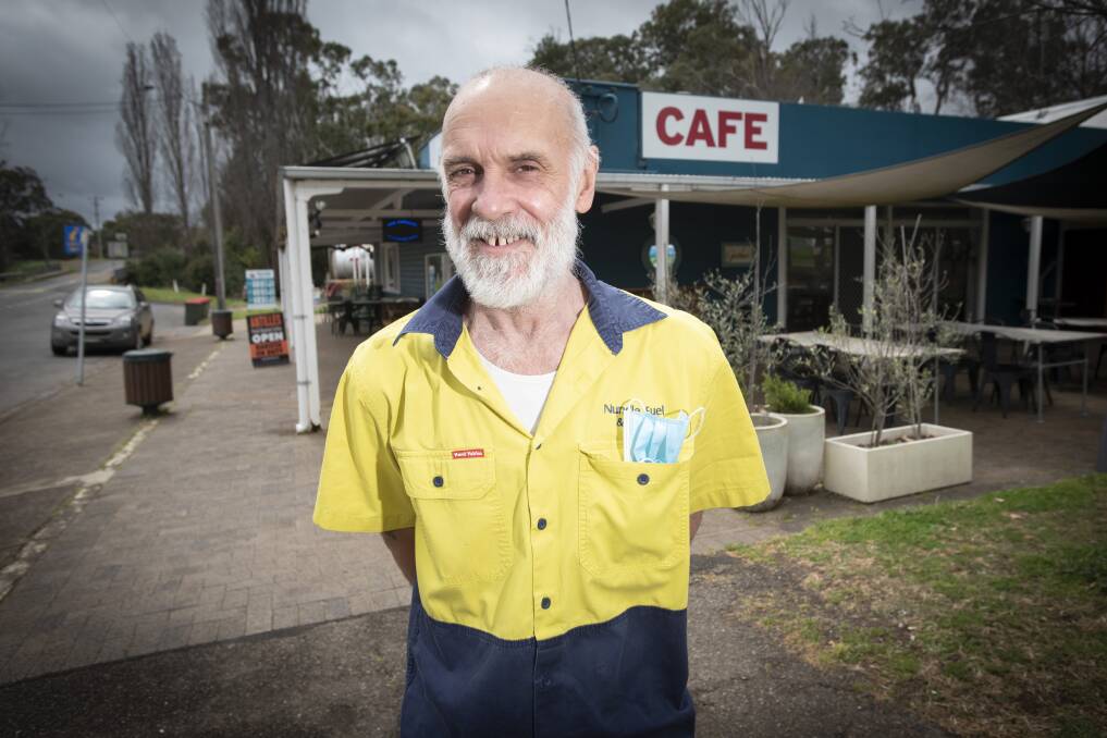 BACK TO NORMAL: Nundle Cafe owner Andrew Brown couldn't help but smile as customers came through the doors regularly over the weekend. Photo: Peter Hardin 140921PHA007