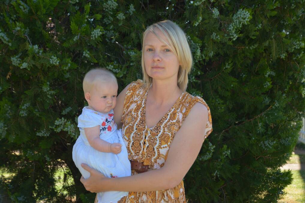 ZERO DOUBT: Tamworth mother Tessa Rainbird said she is pleased the government has committed to an emissions target but wants more done for the sake of her children's future. Photo: Cody Tsaousis