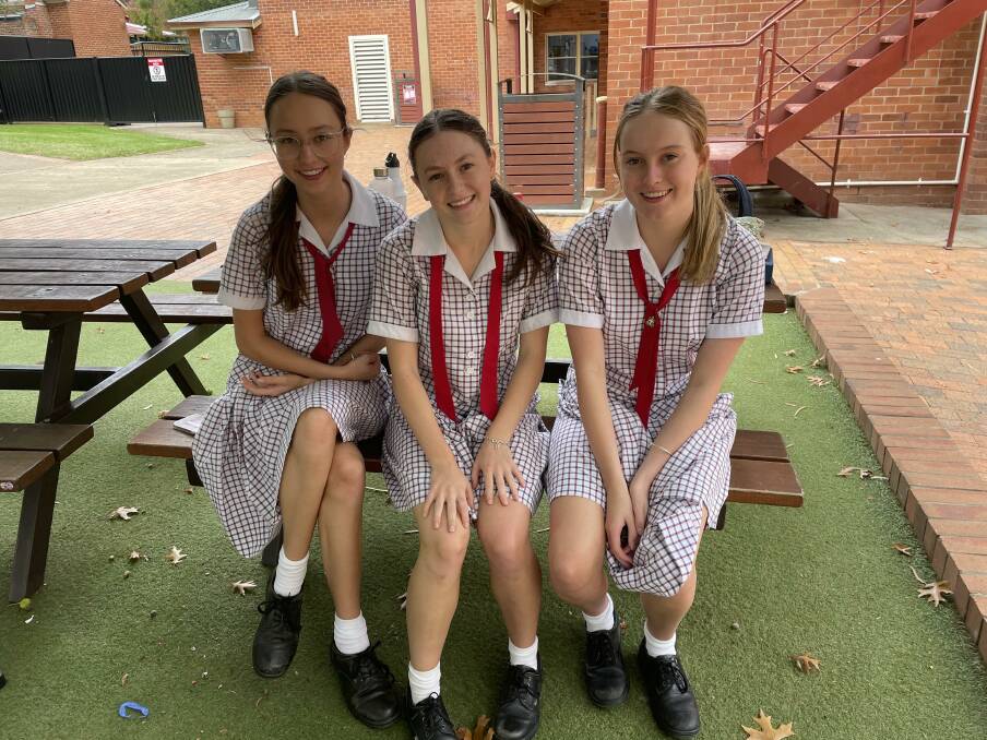 Calrossy students Evelyn Murdoch, Emelyn Haling and Grace Sweeney all said online shopping is part of their life. Photo: supplied