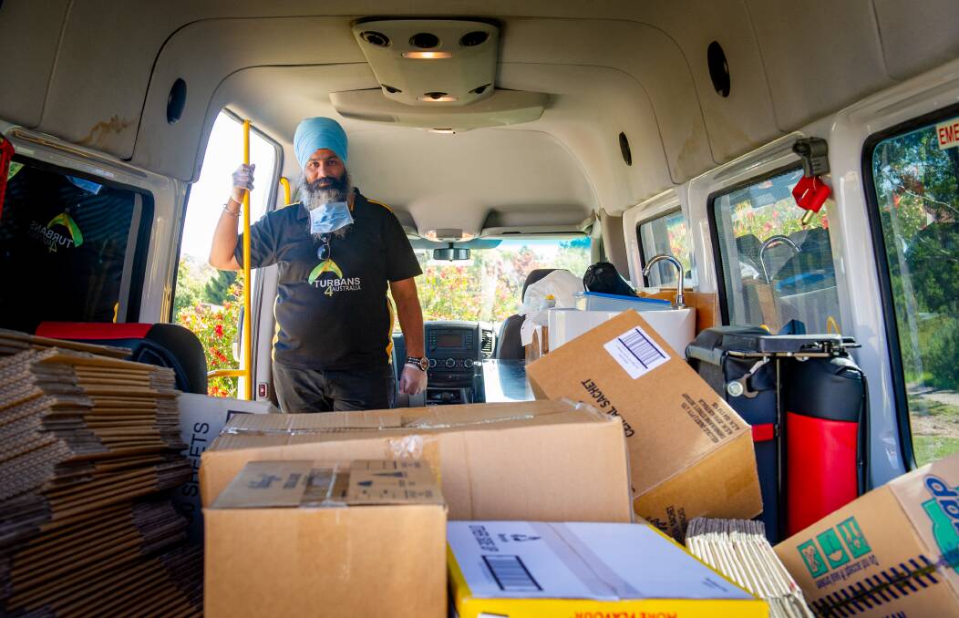 Turbans4Australia president and founder Amar Singh in the van he brought from Sydney to make hamper deliveries in the Canberra region. Picture: Elesa Kurtz 