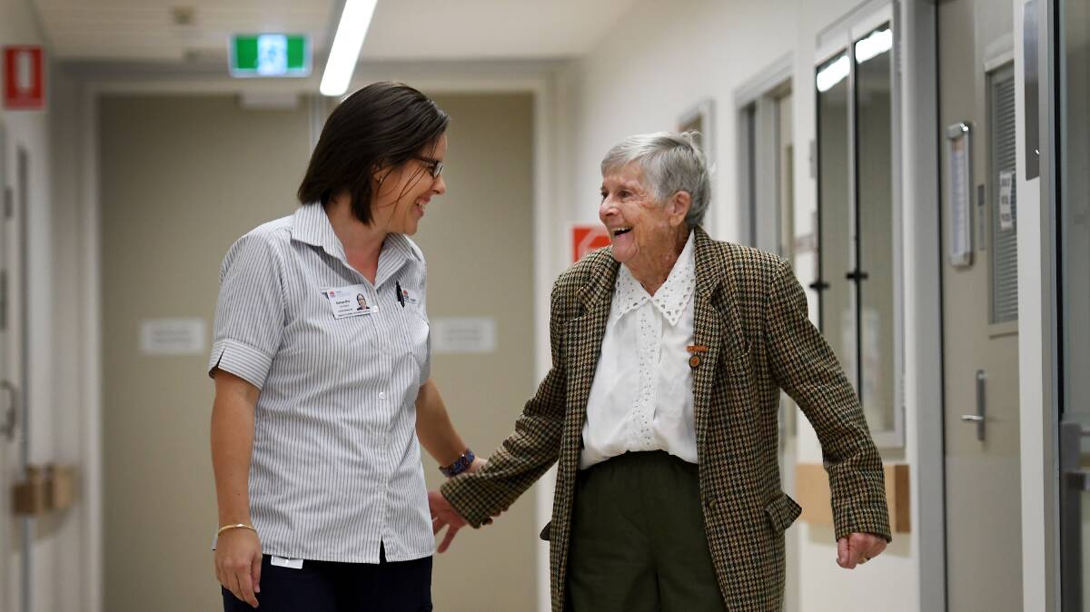 ALL SMILES: Tamworth Hospital Intensive Care Unit nurse manager Samantha Gardner with volunteer Alice Edmunds. Photo: Gareth Gardner